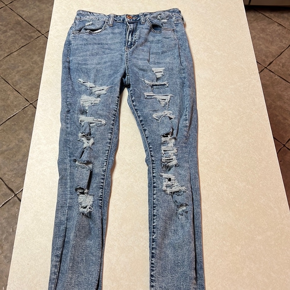 Ultimate high rise jeggings. Patches on holes, from thighs up. Slightly worn.